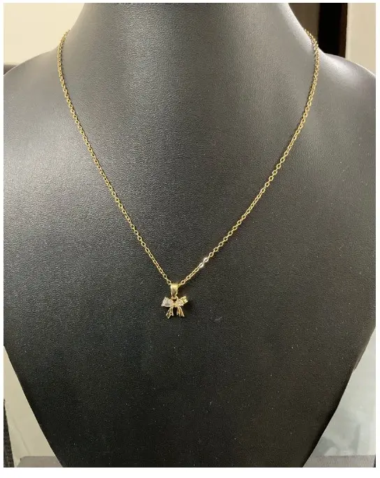 Mini bow solitaire necklace